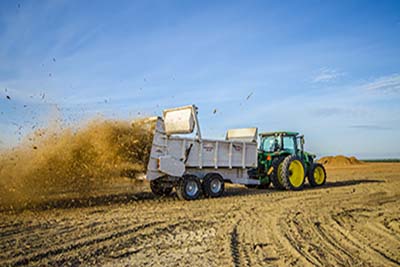Fowler Brothers spreading wood chips